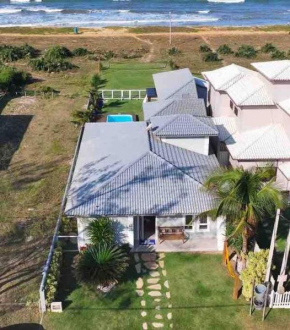 Casa long beach! Totalmente pé na areia.